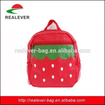 red strawberry school trolley bag