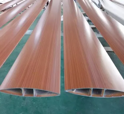 Wood grain treated aluminum extruded shutters