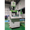 Vertical double sliding rubber injection machine