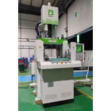 Vertical double sliding rubber injection machine