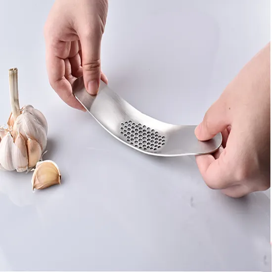 The New Home Stainless Steel Garlic Press