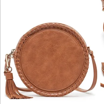 Tassel pendant braided leather round shoulder bag