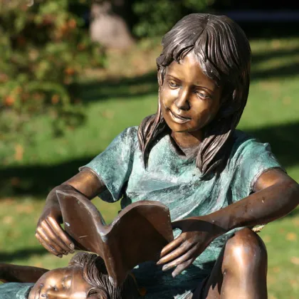 Bronze Girl Reading Statue