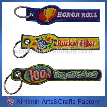 Factory wholesale newest design 100% pvc tag embroidered brand patches