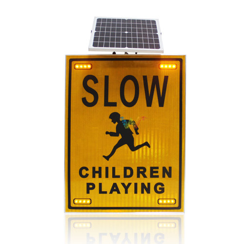 slow down flashing solar road safety warning sign