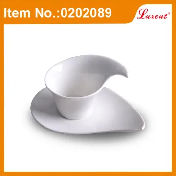 white ceramic espresso coffee cup with saucer