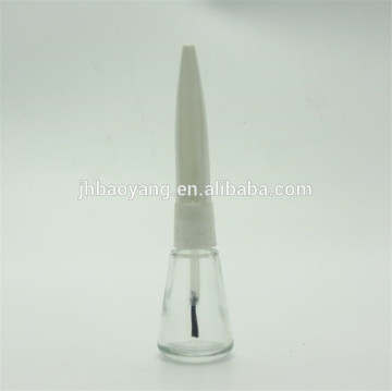 empty nail polish bottle with cap and brush