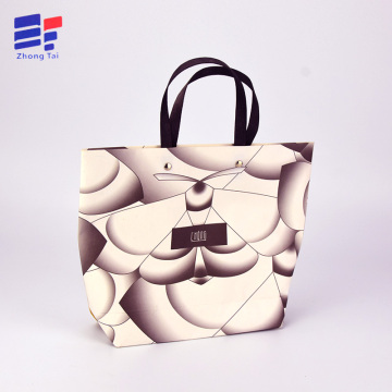 Paper shopping bag for clothing