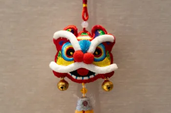 Yi Embroidered Lion Dance Charm