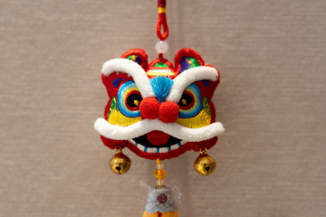 Yi Embroidered Lion Dance Charm