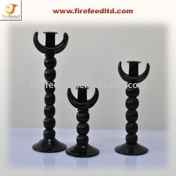Black glass antique candlestick holder