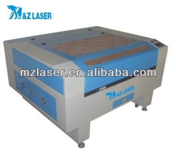 China New! Good Price Nonmetal Material Leather Rubber Plastic Bag Laser Engraving & Cutting Machine