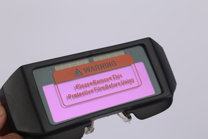 Automatic dimming welding glasses