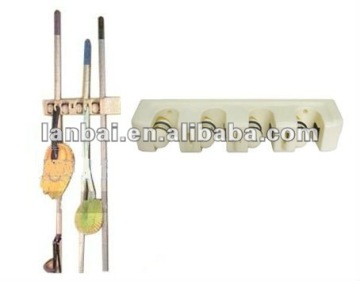Magic broom holder