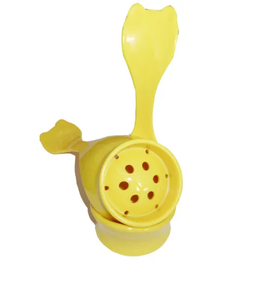 Plastic kitchen gadget spoon with hole