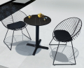 Mesas y sillas para invitados de reunión de ocio de patio