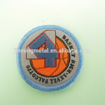 2014 fashion 31mm round shape woven garment label