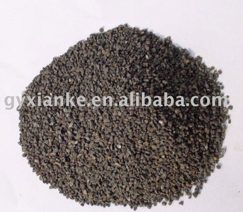 High quality filter material based on magnetite ore for water purification