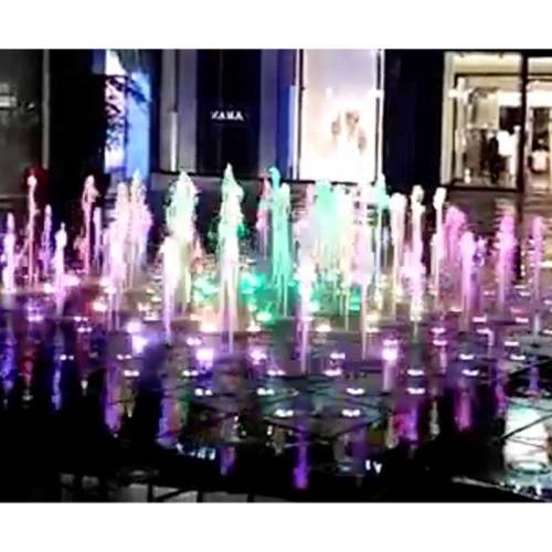 Unique outdoor square fountain at night