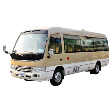 Подержанный автобус Toyota Coaster для продажи: вместительный интерьер с сиденьями ткани, RWD, ручная коробка передач, левое рулевое управление