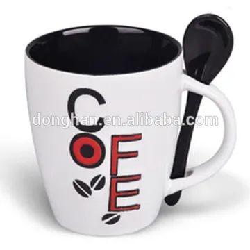 ceramic coffee mug with black spoon