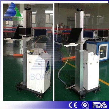 Fiber laser cavity with lifting worktable for flying marking