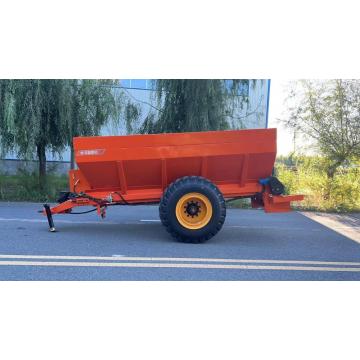 Frozen and dried manure spreader