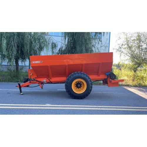 Frozen and dried manure spreader