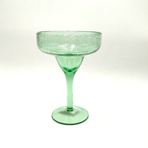 caraffa di vetro verde champagne coupé flute con bolla