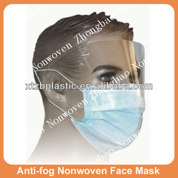 Dental disposable nonwoven face mask with anti-fog eye protection shield