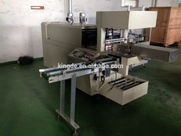 Fully automatic heat shrink machine