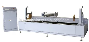 Reel stretch wrapper for fabric reel