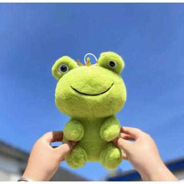 Accessorize with cute little frog stuffed animals