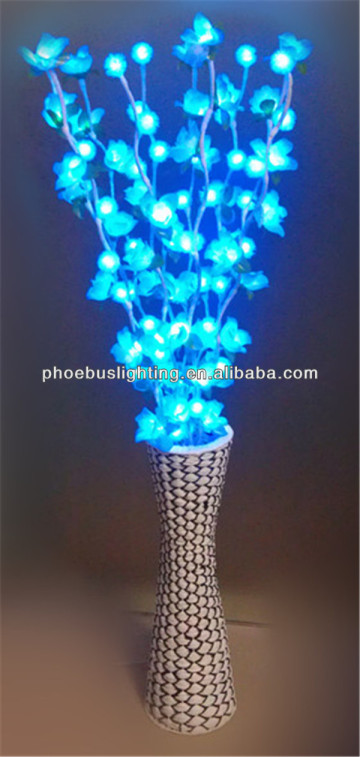 use outdoor decorative lighted trees and flowers