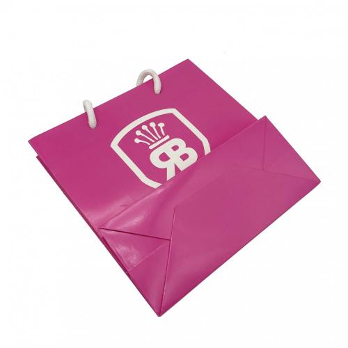 Lyxig logotyp Anpassad glansig rosa presentpapperspåse
