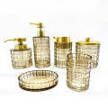 Bottiglia di vetro set da bagno d'oro