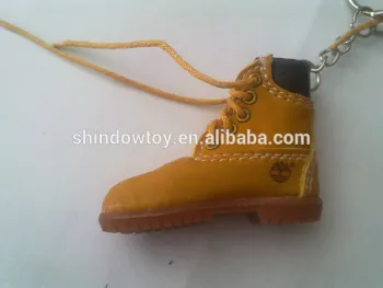 big head leather shoe keychain