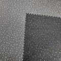 Tessuto jersey lavorato a maglia con pois glitter dorati