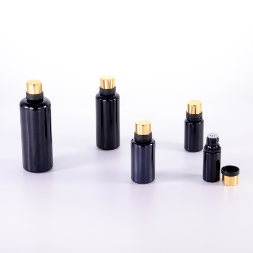 Luxurious Black Essential Oil Bottle Round shoulder black glass bottle for essential oil Supplier