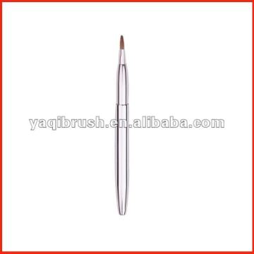 Retractable lip brush cosmetic brush