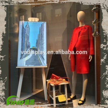 chalkboard window display , chalkboard showcase , fashion store window display furniture