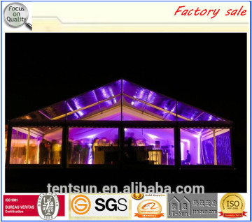 Transparent beautiful wedding hall with light decorations