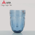 Ato menschliches Gesicht Aussehen Mund Blue Glass Tasse