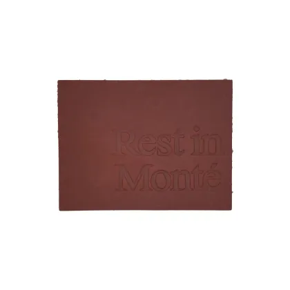 Press letter-shaped leather label