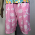 Pink pineapple-patterned beach shorts