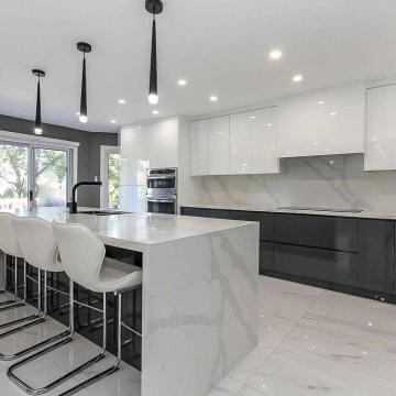 Modern Stone Kitchen with Marble Island and Custom Cabinets