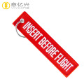 custom name remove before flight ribbon keychains