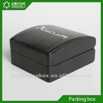 Black wood ring box with white logo