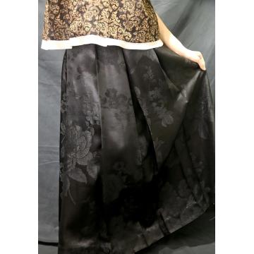 falda larga plisada negra