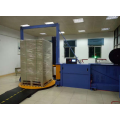 Integrated pallet wrapping and strapping machine